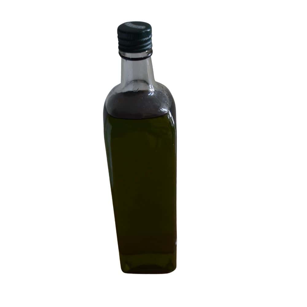 Aceite de Oliva 1 Aceite de oliva virgen extra en botella de vidrio para cocina saludable y natural.